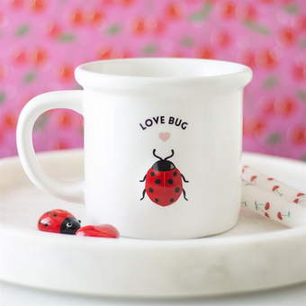 white ceramic mug with 3D ladybird and the word love bug printed