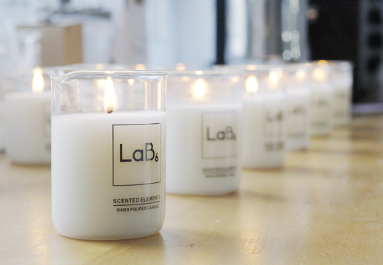 hand poured scented candles, science beakers