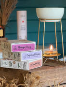 A shot of our Botanical Wax melts and the a selection of the scents we offer. In this image we have: Darjeeling Delights, Stargazer, Wonderland & Pear-Fect 