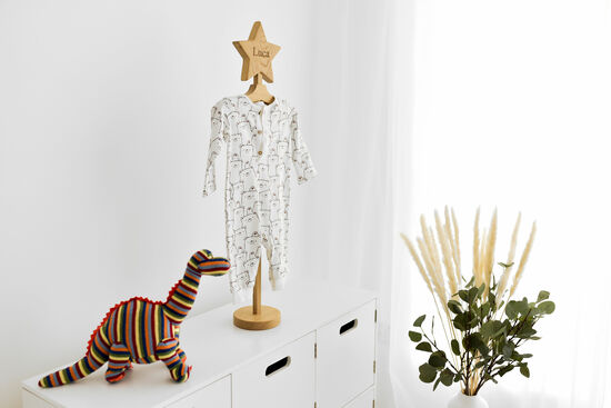 Handmade baby clothing hanger