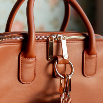 Ladies' laptop clutch bag - designed by women for women. UK design. Bespoke metal work