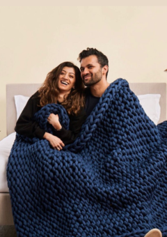 Blue hand-knit weighted throw blanket