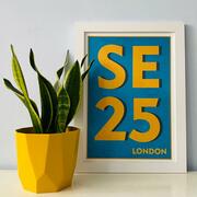 SE25 print in Gold on Teal with plant