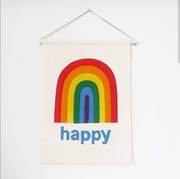 fabric banner on it's own with a tall rainbow stitched on and the word "happy" underneath
