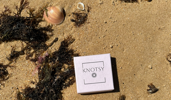 knotsy jewellery box on a beach