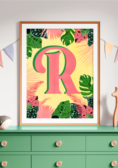 A colourful hand painted initial print of a letter R in coral pink, yellow base surround by pink and green tropical leaves
