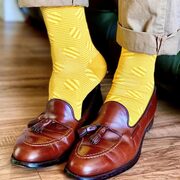 Man wearing Butterscotch Polka Stripe luxury Peper Harow socks