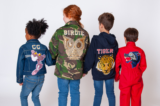 Children in customised clothes jackets, hoodie and jumpsuit. By Cat in the Hood