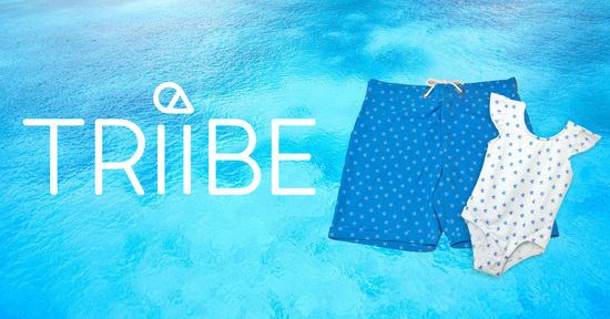 Triibe Logo with Male Swimshorts and Girls One-Piece Costume on a Blue Background