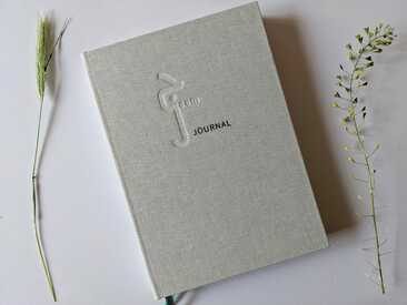 Jeem Journal between flowers