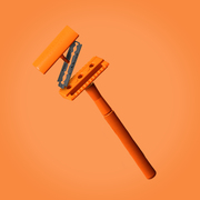 Vivid orange safety razor