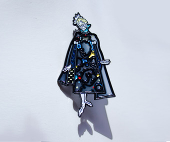 a stained glass enamel pin