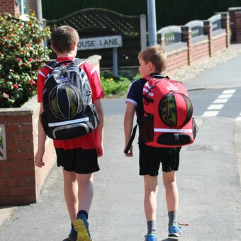 Two very happy boys on there way to the park with their KITSACK's 