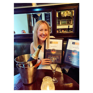 Lizzie celebrating with Scottish Retail Food and Drink Awards
