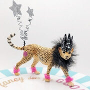 Cheetah Party Animal with silver glitter star balloons and a sparkle crown