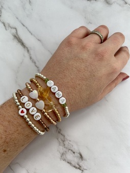 Gold and silver bracelet stack