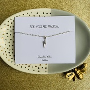 silver tone lightning charm on a delicate silver tone rolo chain, mounted on a white card, sample wording on the card is Zoe, you are magical.