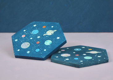 A hexagon trinket tile with all of the planets in it and stars by Astral Tides
