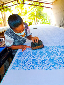 Artisan Chanda busy blockprinting fabric by hand for Shakti.ism