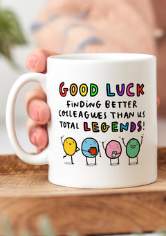 Funny mug that reads "Good Luck finding better colleagues than us total legends" along with a charming illustration