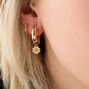 Chunky hoop earrings with daisy flower charm