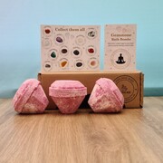 A set of 3 gemstone shaped bath bombs with real mystery gemstones inside