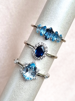 Blue sapphire halo ring, ombre blue topaz ring and sky blue topaz ring in sterling silver - Vianne Jewellery