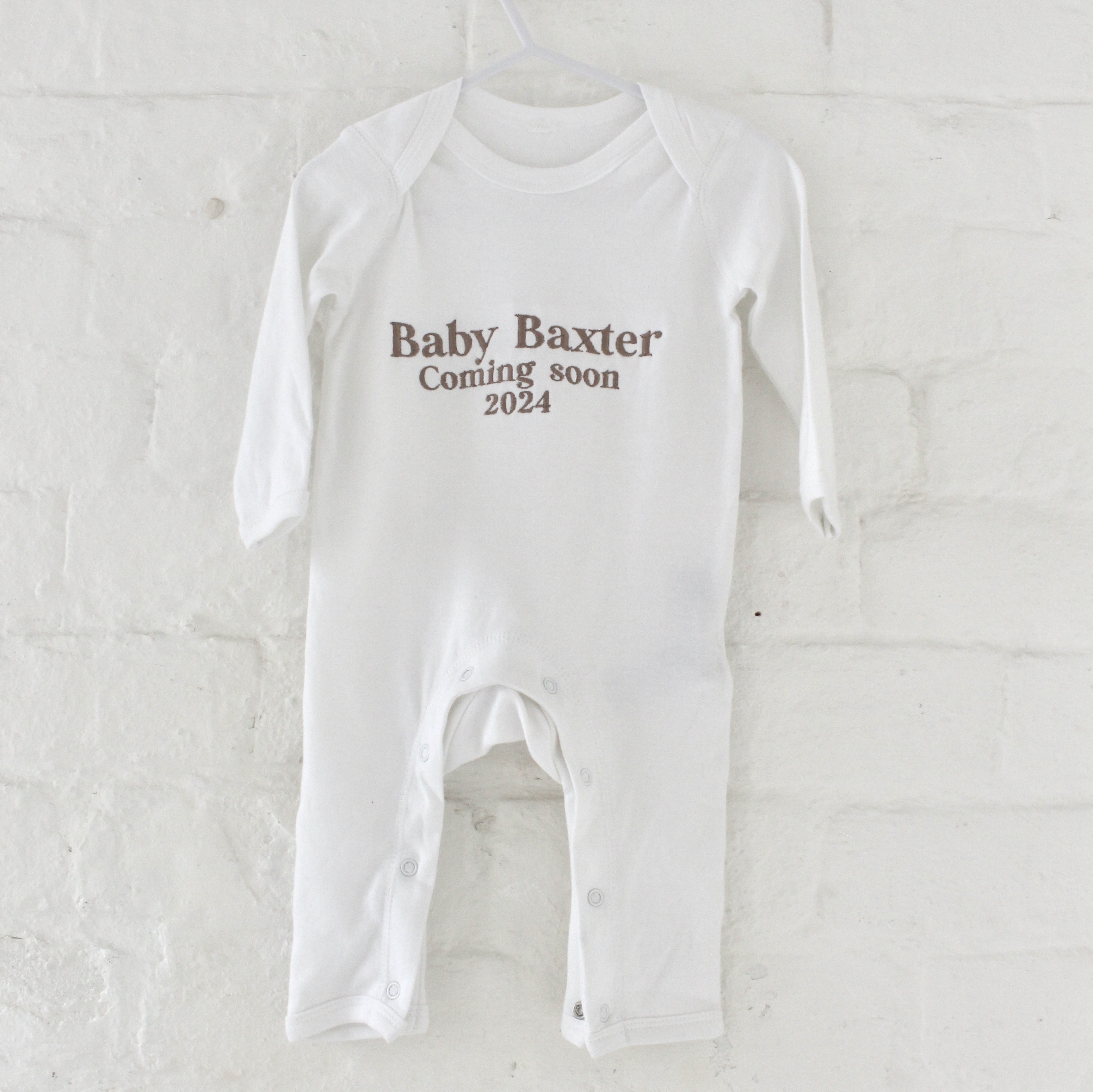 'Coming Soon' Embroidered Long Sleeve Babygro