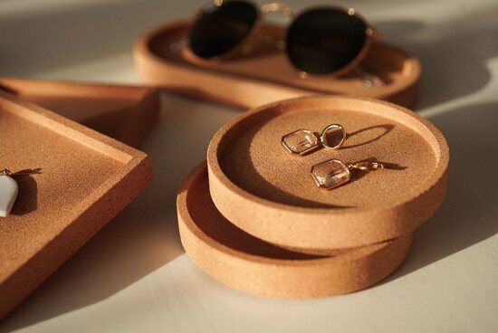 Handmade terracotta coasters with minimalist gold earrings