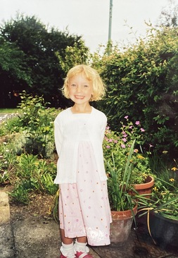 Myself, in my Grandma & Grandad's garden as a little girl