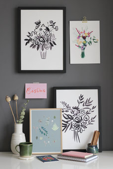 Gallery wall featuring various botanical prints