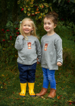 Little girls wearing Cheeky Horse T-shirt by Cotswold Baby Co