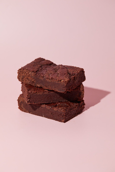 A stack of vegan salted caramel brownies