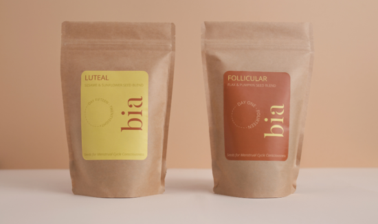 Bia luteal blend and follicular blend pouches standing side by side on peace background
