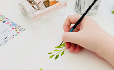 Hand painting botanical watercolour designs 