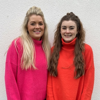 co-founder gem and kate in bright jumpers