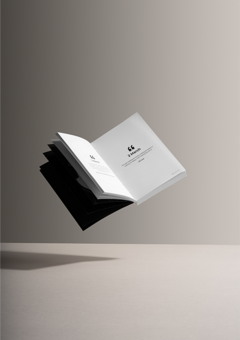 Floating book with the pages open. The page shows two lyrics across a double spread.