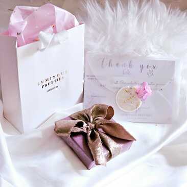 Gift wrapped items arrive in eco friendly luxurious ribbons with a choice of personalised handwritten message and a Brand Gift Bag 