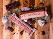 Photo of the dark chocolate premium protein bar and also the dark chocolate and ginger premium protein bar 