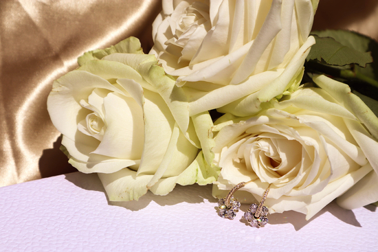 Luxury Flower Gift Earrings laden by Ivory Roses.