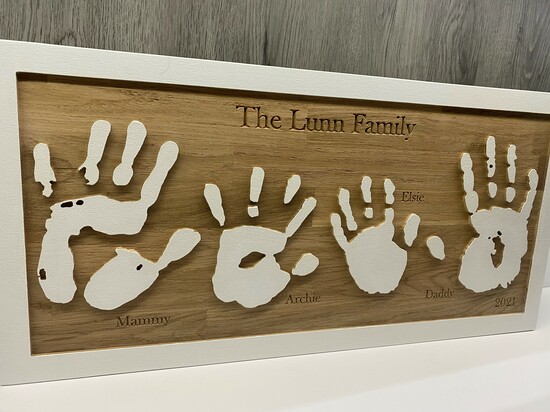 Solid oak wall hanging of your family's handprints