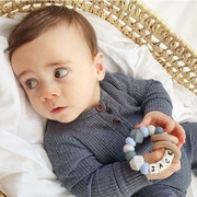 Jack with his personalised Teether.  Silicone and wood personalised Teething toy.