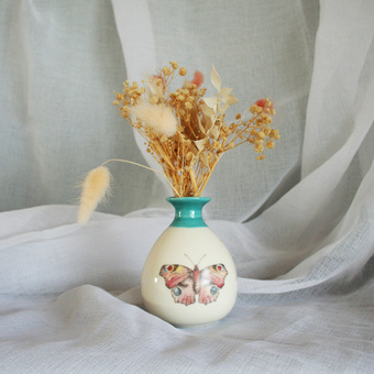 porcelain bud vase with butterfly in blue