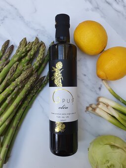 Extra virgin olive oil bottle and Spring veggies