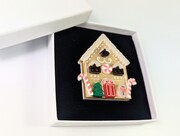 A ginger bread house brooch