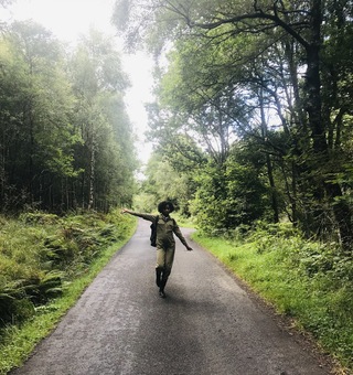 woman in forest scotland