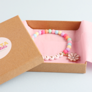 kraft gift box with bracelet wrapped in tissue paper