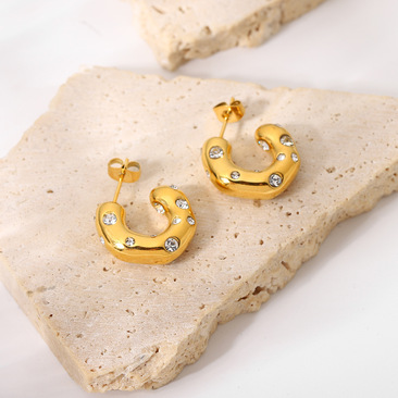 Cubic Zirconia encrusted chunky hoop earring in gold