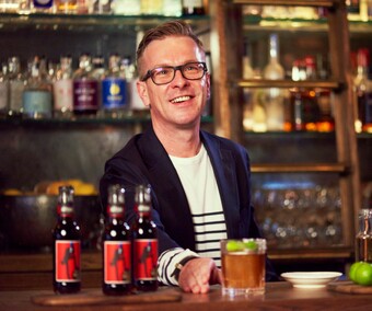 Award winning bartender and the man behind the Artisan recipes, Mikey Enright, serving our Barrel Smoked Cola