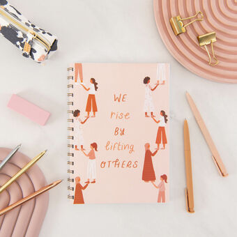 'We rise by lifting others' women's empowerment notebook